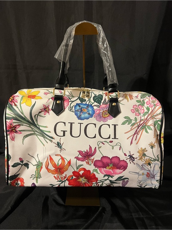 Gucci Handbags - GUCCI White Floral Logo Duffle Bag